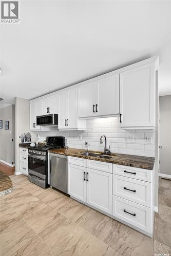 2106 Styles Crescent, Regina, SK - Indoor Photo Showing Kitchen With Double Sink With Upgraded Kitchen