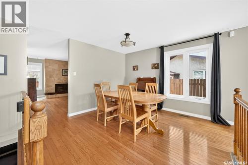 2106 Styles Crescent, Regina, SK - Indoor Photo Showing Dining Room With Fireplace