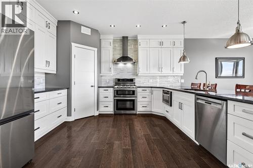 156 Iron Bridge Drive, Moose Jaw, SK - Indoor Photo Showing Kitchen With Upgraded Kitchen