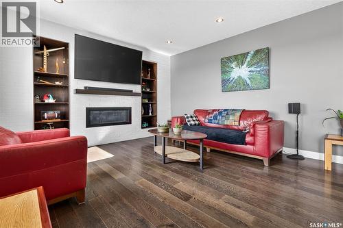 156 Iron Bridge Drive, Moose Jaw, SK - Indoor Photo Showing Living Room With Fireplace