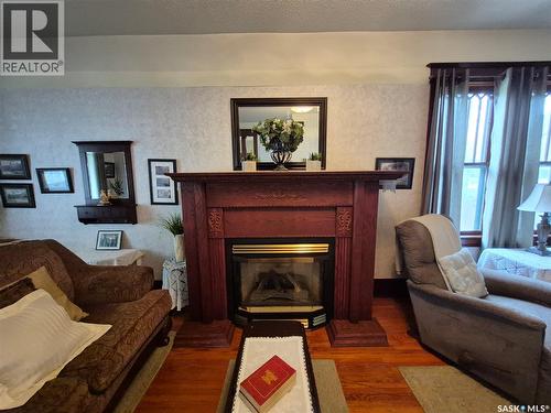 244 3Rd Avenue Nw, Swift Current, SK - Indoor Photo Showing Living Room With Fireplace