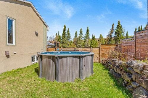 Pool - 711 Rue Mary, Sainte-Agathe-Des-Monts, QC - Outdoor With Above Ground Pool