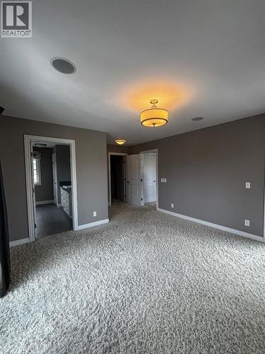 1 Murmansk Way Sw, Calgary, AB - Indoor Photo Showing Other Room