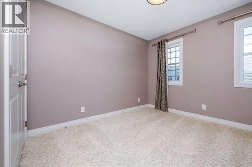 1 Murmansk Way Sw, Calgary, AB - Indoor Photo Showing Other Room