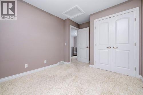 1 Murmansk Way Sw, Calgary, AB - Indoor Photo Showing Other Room