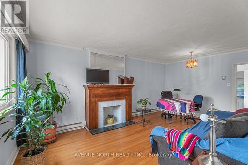 1210 Erie Avenue, Ottawa, ON - Indoor Photo Showing Living Room With Fireplace