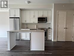 414 - 3006 WILLIAM CUTMORE BOULEVARD Oakville, ON L6H 8A4