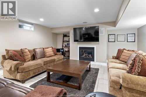 2105 Washington Boulevard, Lasalle, ON - Indoor Photo Showing Living Room With Fireplace