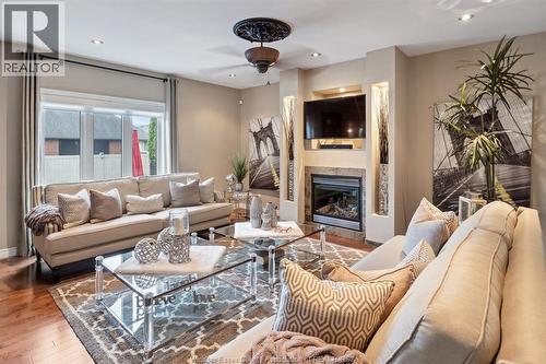 2105 Washington Boulevard, Lasalle, ON - Indoor Photo Showing Living Room With Fireplace