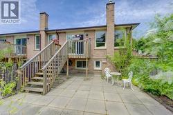 Brick exterior featuring multiple windows - 