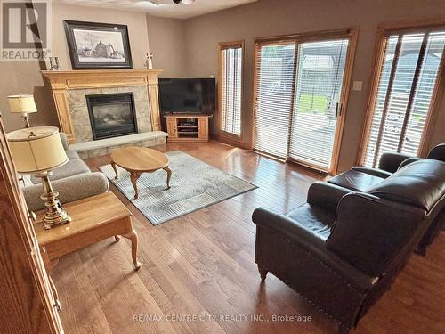 FAMILY ROOM WITH GAS FIREPLACE - 31 Cavanaugh Crescent, St. Thomas, ON - Indoor Photo Showing Living Room With Fireplace