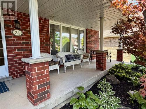 COVERED FRONT PORCH - 31 Cavanaugh Crescent, St. Thomas, ON - Outdoor With Deck Patio Veranda