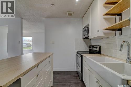3 Hunt Crescent, Regina, SK - Indoor Photo Showing Kitchen With Double Sink