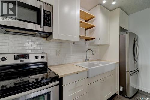3 Hunt Crescent, Regina, SK - Indoor Photo Showing Kitchen With Stainless Steel Kitchen With Double Sink