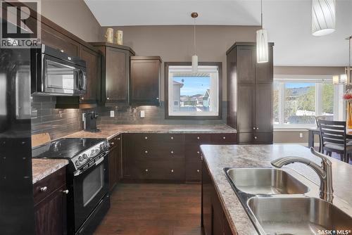 4117 Green Rose Crescent, Regina, SK - Indoor Photo Showing Kitchen With Double Sink