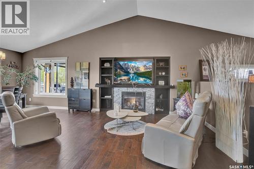 4117 Green Rose Crescent, Regina, SK - Indoor Photo Showing Living Room With Fireplace