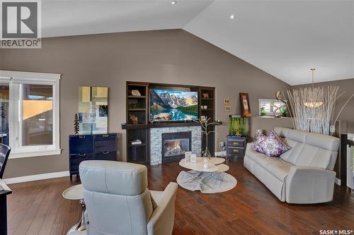 4117 Green Rose Crescent, Regina, SK - Indoor Photo Showing Living Room With Fireplace