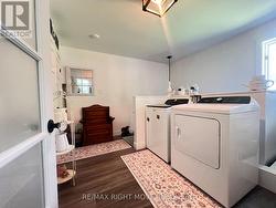 Laundry w Entrance to garage & stairs to basement - 