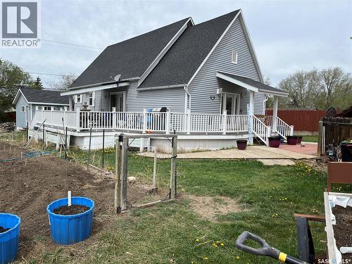 158 Municipal Road, Coronach, SK - Outdoor With Above Ground Pool With Deck Patio Veranda