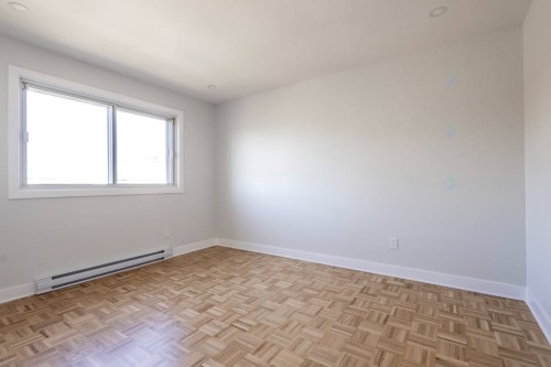 Bedroom - 12404 Rue Ferdinand-Bastien, Montréal (Rivière-Des-Prairies/Pointe-Aux-Trembles), QC - Indoor Photo Showing Other Room
