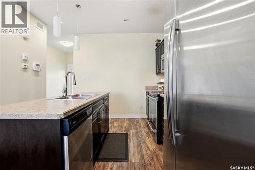 4 3960 7Th Avenue E, Regina, SK - Indoor Photo Showing Kitchen With Double Sink With Upgraded Kitchen