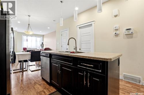 4 3960 7Th Avenue E, Regina, SK - Indoor Photo Showing Kitchen With Double Sink With Upgraded Kitchen