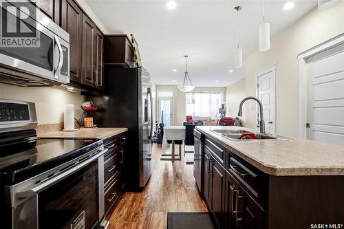 4 3960 7Th Avenue E, Regina, SK - Indoor Photo Showing Kitchen With Double Sink With Upgraded Kitchen