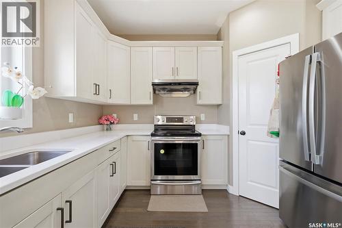 211 Baltzan Boulevard, Saskatoon, SK - Indoor Photo Showing Kitchen With Double Sink