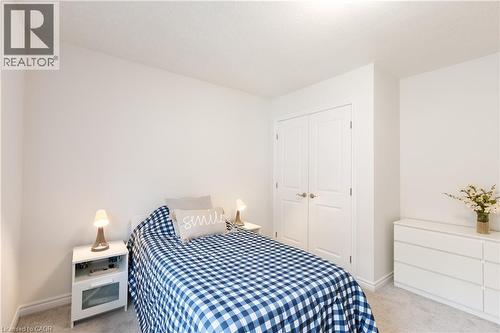Bright room with light-toned walls and plush carpeting - 581 Doonwoods Crescent, Kitchener, ON - Indoor Photo Showing Bedroom