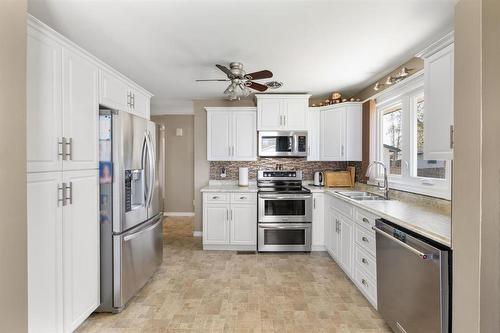 253 Stradford Street, Winnipeg, MB - Indoor Photo Showing Kitchen With Double Sink