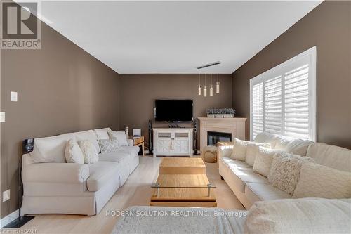 115 Erika Crescent, Hamilton, ON - Indoor Photo Showing Living Room With Fireplace