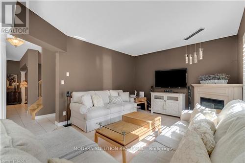 115 Erika Crescent, Hamilton, ON - Indoor Photo Showing Living Room With Fireplace