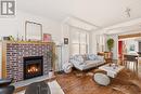 176 Hinton Avenue N, Ottawa, ON  - Indoor Photo Showing Living Room With Fireplace 