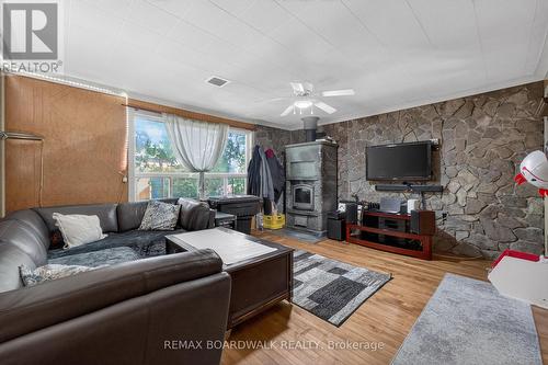 Living Room w/a WETT- Certified Wood Stove - 92 Orvigale Road, Ottawa, ON - Indoor Photo Showing Living Room