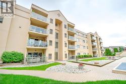 320 VILLAGE GROVE DRIVE Unit# A401 Tecumseh, ON N8N 4X7