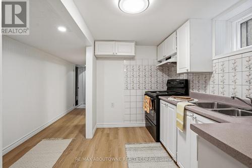 106 Beland Avenue N, Hamilton, ON - Indoor Photo Showing Kitchen With Double Sink