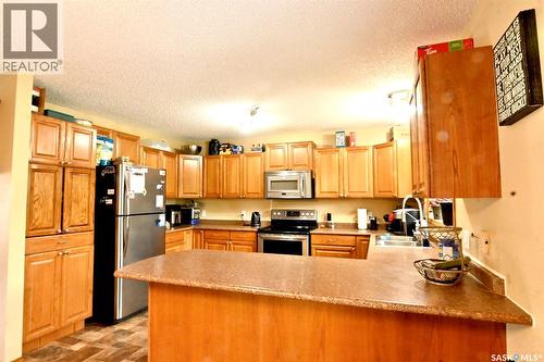 311 Walter Scott Avenue, Hanley, SK - Indoor Photo Showing Kitchen With Double Sink