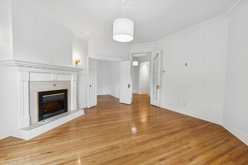 Salon - 7-2090 Rue Sherbrooke O., Montréal (Ville-Marie), QC - Indoor Photo Showing Living Room With Fireplace