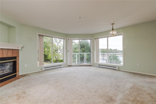 #304-75 Bryden St, Nanaimo, BC - Indoor Photo Showing Living Room With Fireplace