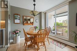 Dining room with patio walkout to private balcony - 