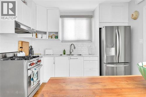 712 Gladstone, Windsor, ON - Indoor Photo Showing Kitchen With Double Sink