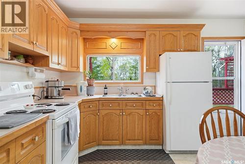 107-109 Shawondasse Drive, Manitou Beach, SK - Indoor Photo Showing Kitchen With Double Sink