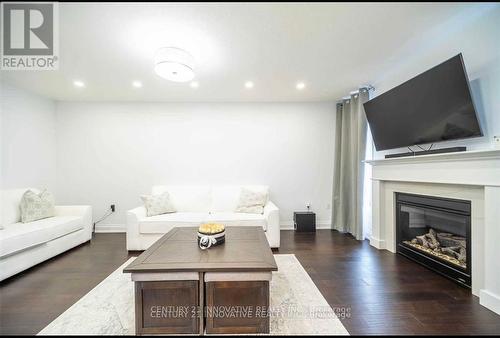 Upper - 165 Emick Drive, Hamilton, ON - Indoor Photo Showing Living Room With Fireplace