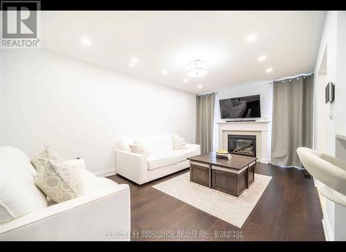 Upper - 165 Emick Drive, Hamilton, ON - Indoor Photo Showing Living Room With Fireplace
