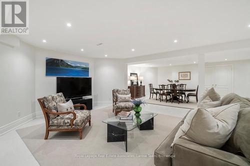 Basement with Large, Open Space/Porcelain Tiles - 562 Gladwyne Court, Mississauga, ON - Indoor Photo Showing Living Room