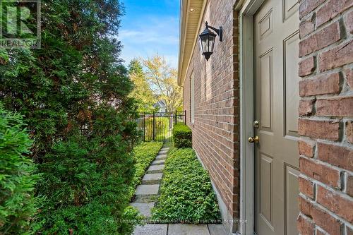 Backyard Side Exit to Front of House & Garage - 562 Gladwyne Court, Mississauga, ON - Outdoor