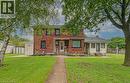 Brick exterior residence with a concrete pathway leading to the front entry - 128 Pollock Avenue, Cambridge, ON  - Outdoor 