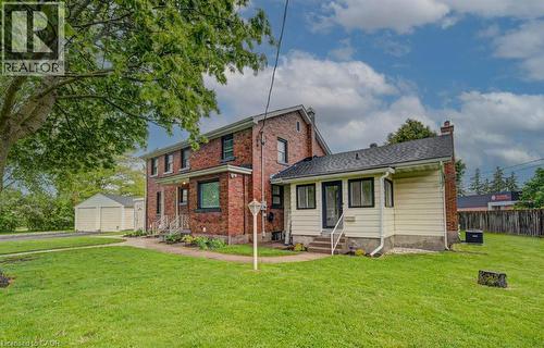 Brick and siding exterior with a multi-level structure - 128 Pollock Avenue, Cambridge, ON - Outdoor