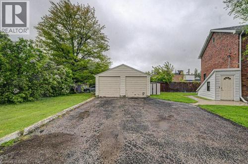 Detached two-car garage with dual overhead doors - 128 Pollock Avenue, Cambridge, ON - Outdoor