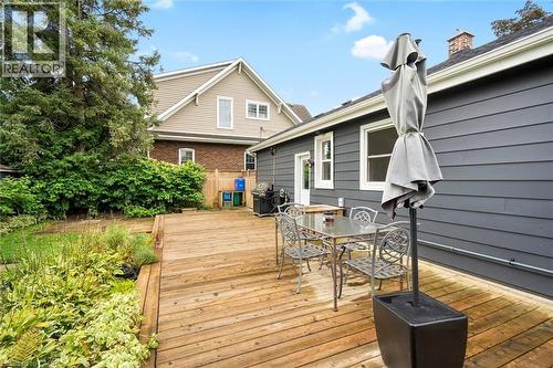 Expansive wood deck with plank construction, surrounded by mature landscaping - 6295 Guelph Line, Burlington, ON - Outdoor With Deck Patio Veranda With Exterior